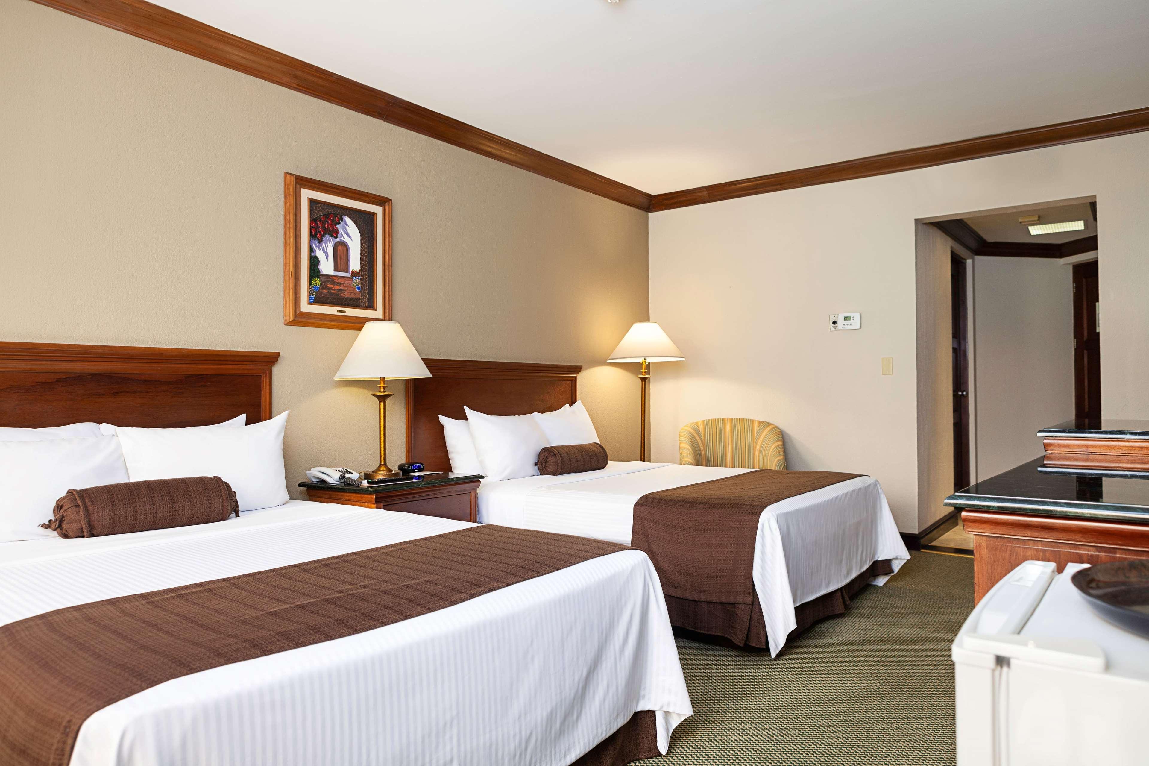 Wyndham San Jose Herradura Luaran gambar A typical hotel room